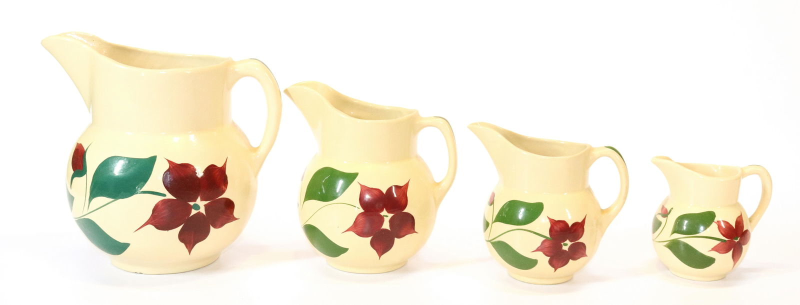 (4) WATT WARE STAR FLOWER PITCHERS (1 of 5)