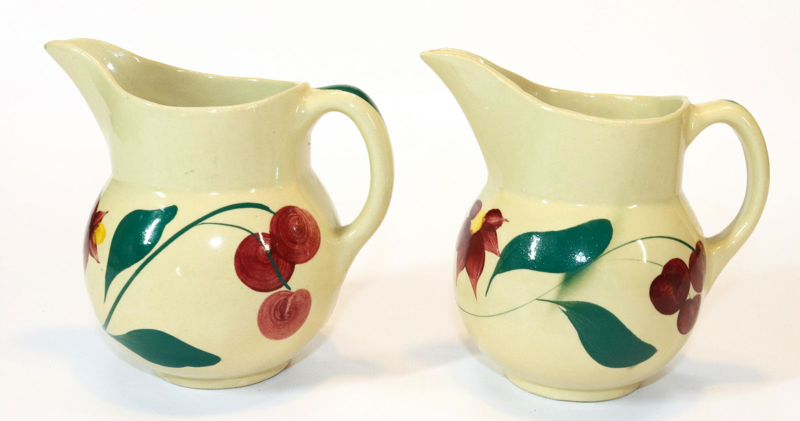 (2) WATT WARE CHERRY PITCHERS (1 of 4)