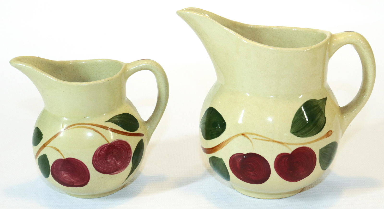 (2) WATT WARE POTTERY DOUBLE APPLE PITCHERS (1 of 4)