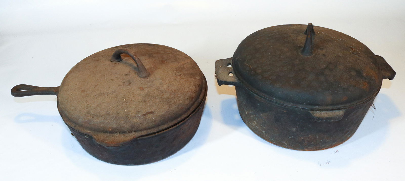(2) HEAVY CAST IRON COOKING POTS (1 of 4)