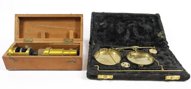 BRASS SCALE AND MICROSCOPE: BALANCE SCALE #508 IN FITTED CASE. WITH BRASS PORTABLE MICROSCOPE IN FITTED WOODEN CASE. MICROSCOPE MEASURES 6" H Terms & Conditions: Pick-up for this Auction will be Wednesday August 3rd and