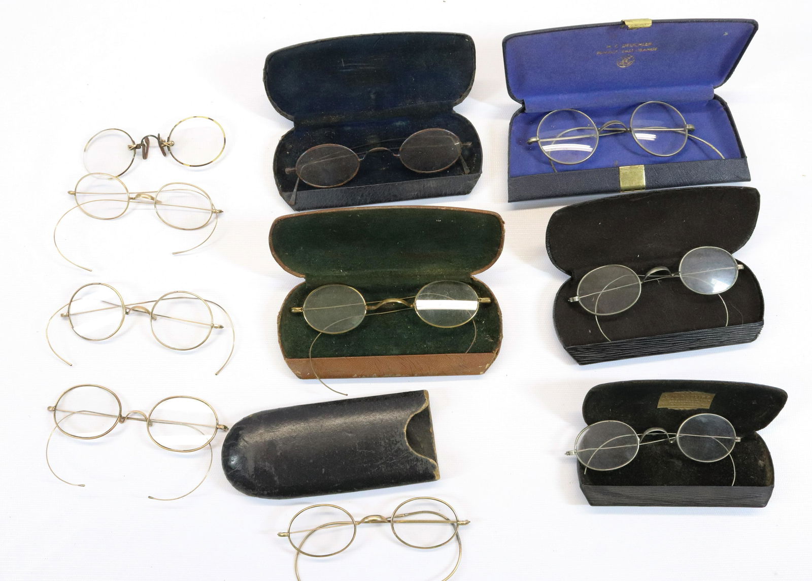 LOT OF EARLY EYEGLASSES: VARIOUS SIZE AND SHAPE. SOME WITH CASES Terms & Conditions: Pick-up for this Auction will be Wednesday August 3rd and Thursday August 4th from 9:00am till 3:30pm and Friday August 5th from 9:00am till