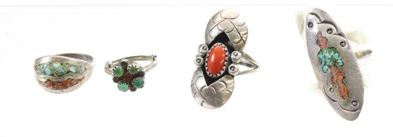 NATIVE AMERICAN SILVER RINGS: INCLUDES FOUR RINGS WITH CARNELIAN TURQUOISE UNMARKED SIZES 3,6,6,8 .5 OZT Terms & Conditions: Pick-up for this Auction will be Wednesday August 3rd and Thursday August 4th from 9:00am till 3:30pm and