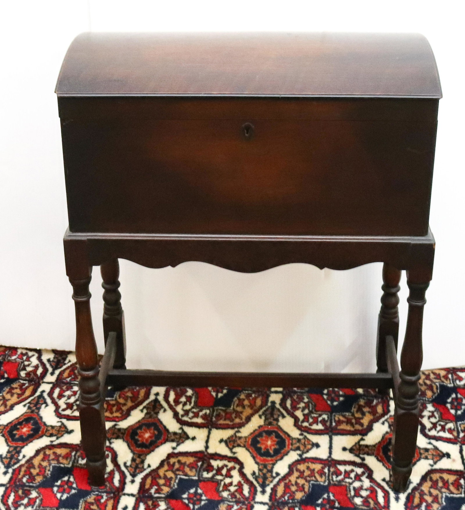 DOMETOP SEWING BOX: HINGED LID BOX ATTACHED TO TURNED LEG BASE. SOME SEWING NOTIONS IN THE INTERIOR. MEASURES 25" X 18" X 10 1/2" Terms & Conditions: Pick-up for this Auction will be Wednesday August 3rd and Thursday Aug