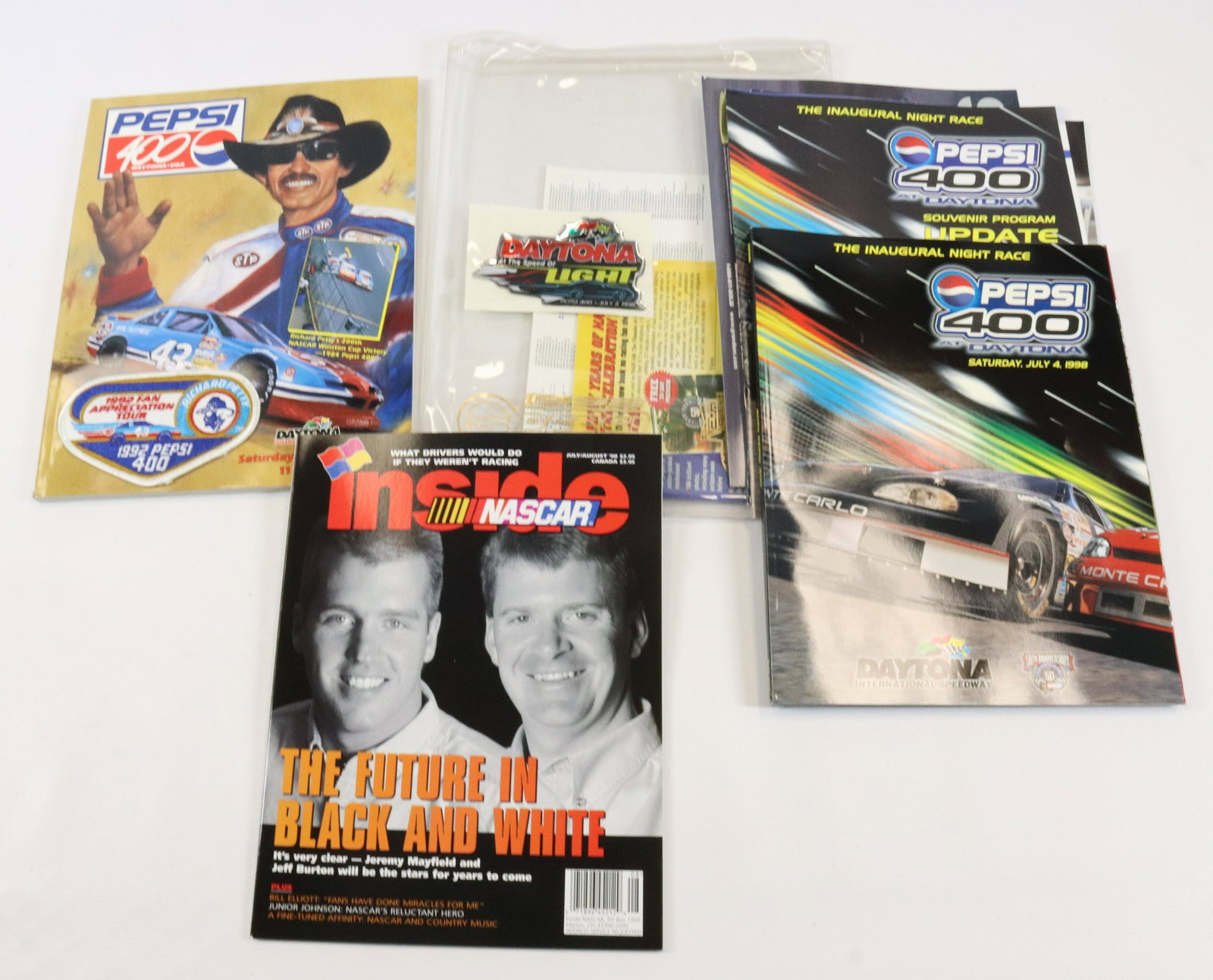 (2) PEPSI 400 AT DAYTONA SOUVENIR BOOKS: 1992 AND 1998 (INAUGURAL NIGHT RACE)