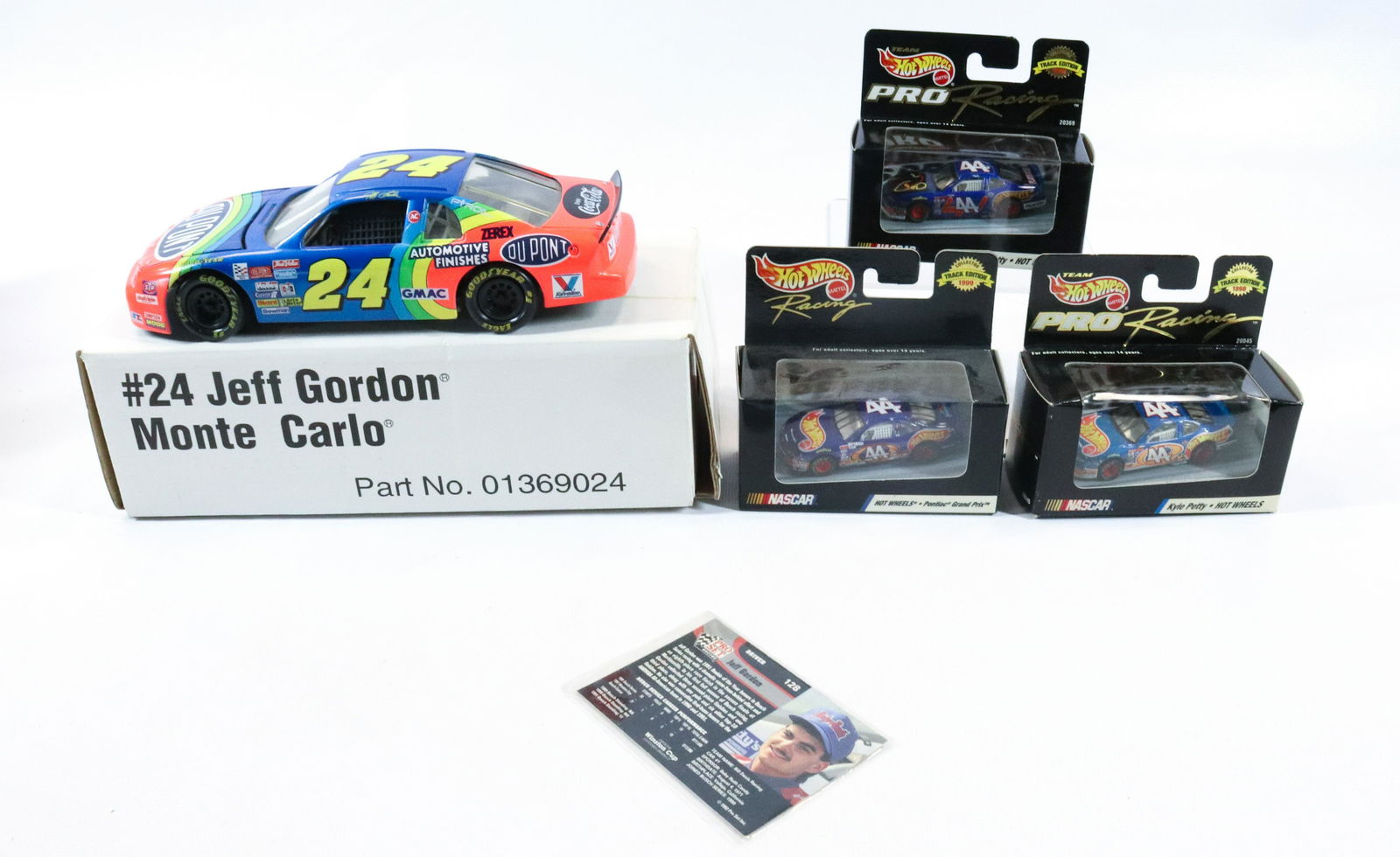 LOT OF COLLECTIBLE RACING CARS: INCLUDING: (3) NASCAR KYLE PETTY HOT WHEELS IN BOX, REVELL JEFF GORDON DIE-CAST MODEL IN BOX AND JEFF GORDON PRO SET DRIVER CARD