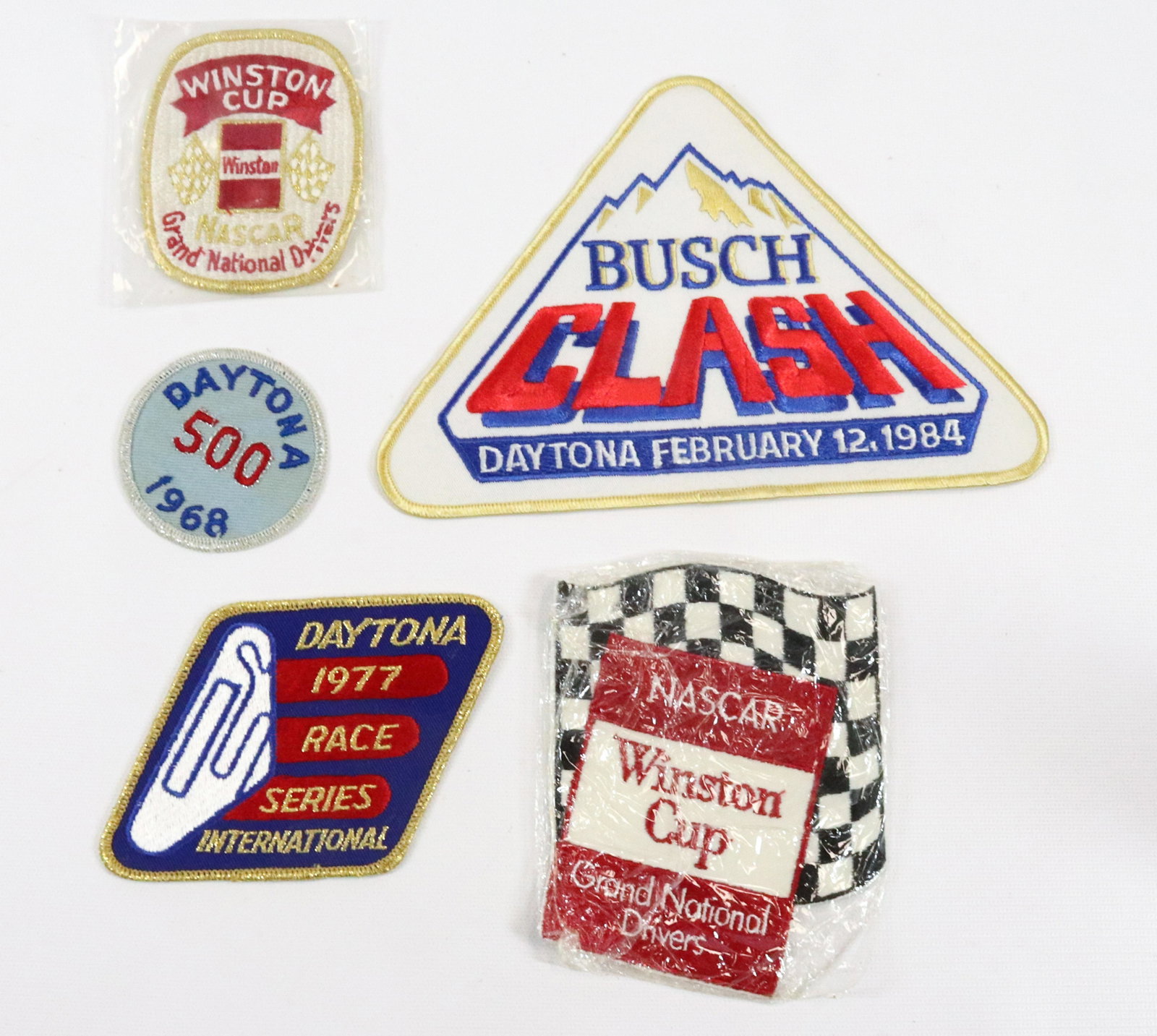 LOT OF VINTAGE RACING PATCHES: INCLUDING: DAYTONA 500 (1968), DAYTONA INTERNATIONAL 1977 RACE SERIES, TWO WINSTON CUP AND 1984 BUSCH CLASH DAYTONA