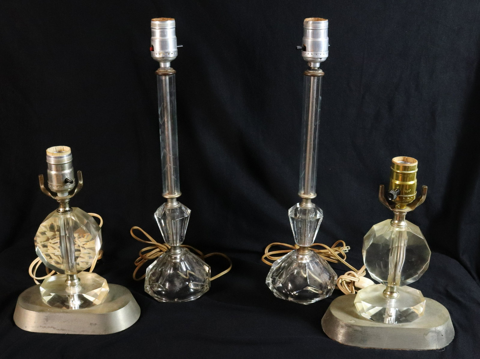 TWO PAIRS OF VINTAGE BOUDOIR LAMPS: TALL PAIR HAS ETCHED FLORAL PATTERN. SMALLER HAVE SILVER PAINTED BASES. TWO SHADES. MEASURE 9 3/4" AND 16 1/2" H. Terms: THIS IS AN ON-SITE ONLINE ONLY AUCTION. THE SALE ADDRESS IS 718 STOKES MILL RD.