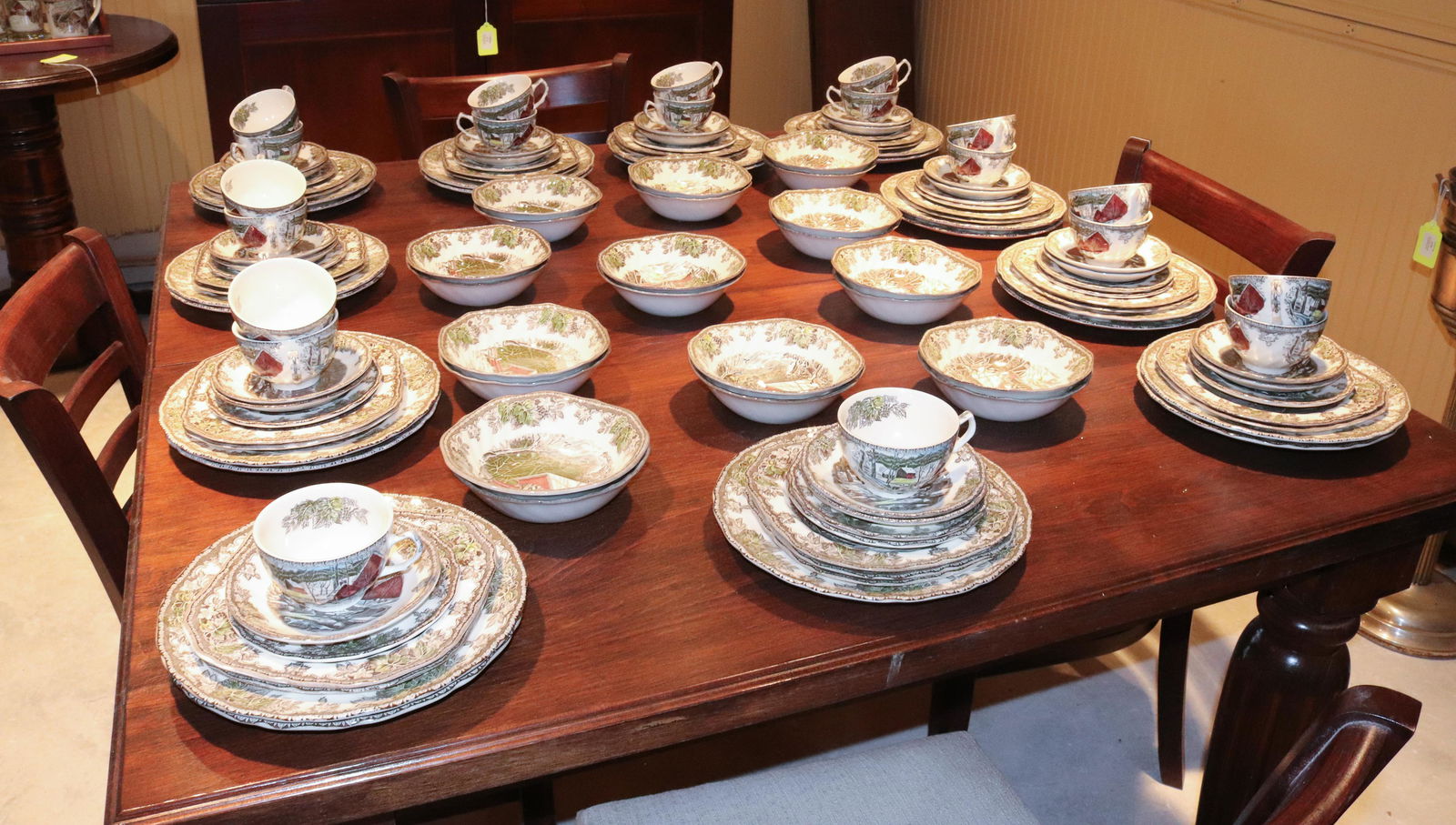 LARGE DISHWARE SET THE FRIENDLY VILLAGE BY JOHNSON BROTHERS: INCLUDING: 21 DINNER PLATES, 22 SQUARE LUNCHEON PLATES, 14 BREAD/BUTTER PLATES, 21 SAUCERS, 20 CUPS AND 22 BOWLS. DINNER PLATES 9 3/4" D. Terms: THIS IS AN ON-SITE ONLINE ONLY AUCTION. THE SALE ADDRES