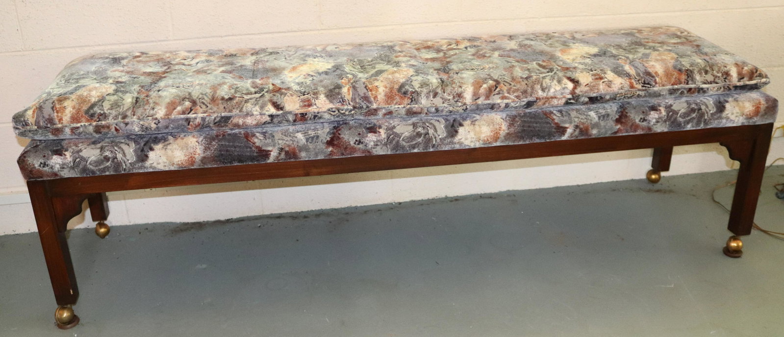 UPHOLSTERED HALL SEAT: VELVET FABRIC. WOOD FRAMEWORK ON CASTERS. MEASURES 21" X 72" X 18". Terms: THIS IS AN ON-SITE ONLINE ONLY AUCTION. THE SALE ADDRESS IS 718 STOKES MILL RD. EAST STROUDSBURG, PA 18302. THIS IS THE ESTAT