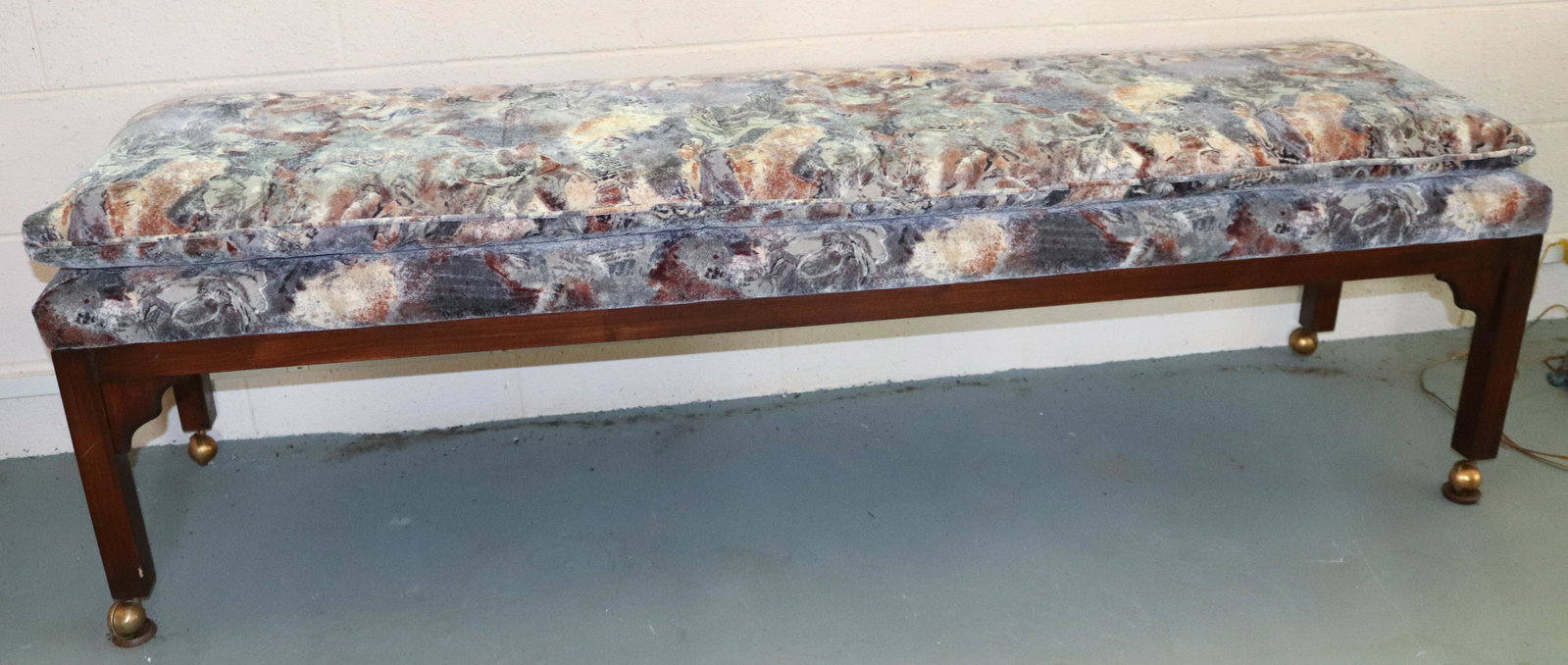 UPHOLSTERED HALL SEAT: VELVET FABRIC. WOOD FRAMEWORK ON CASTERS. MEASURES 21" X 72" X 18". Terms: THIS IS AN ON-SITE ONLINE ONLY AUCTION. THE SALE ADDRESS IS 718 STOKES MILL RD. EAST STROUDSBURG, PA 18302. THIS IS THE ESTAT