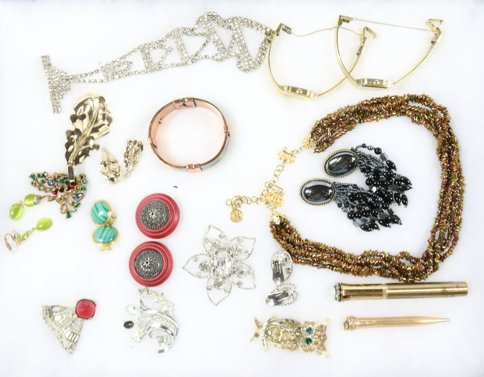 COSTUME JEWELRY TRAY LOT: HOBE RHINESTONE NECKTIE 8" OWL BROOCH TWO WRIST WATCHES EARRINGS FREDERICK BROOCH AND EARRINGS Terms: THIS IS AN ON-SITE ONLINE ONLY AUCTION. THE SALE ADDRESS IS 718 STOKES MILL RD. EAST STROUDSBURG, 