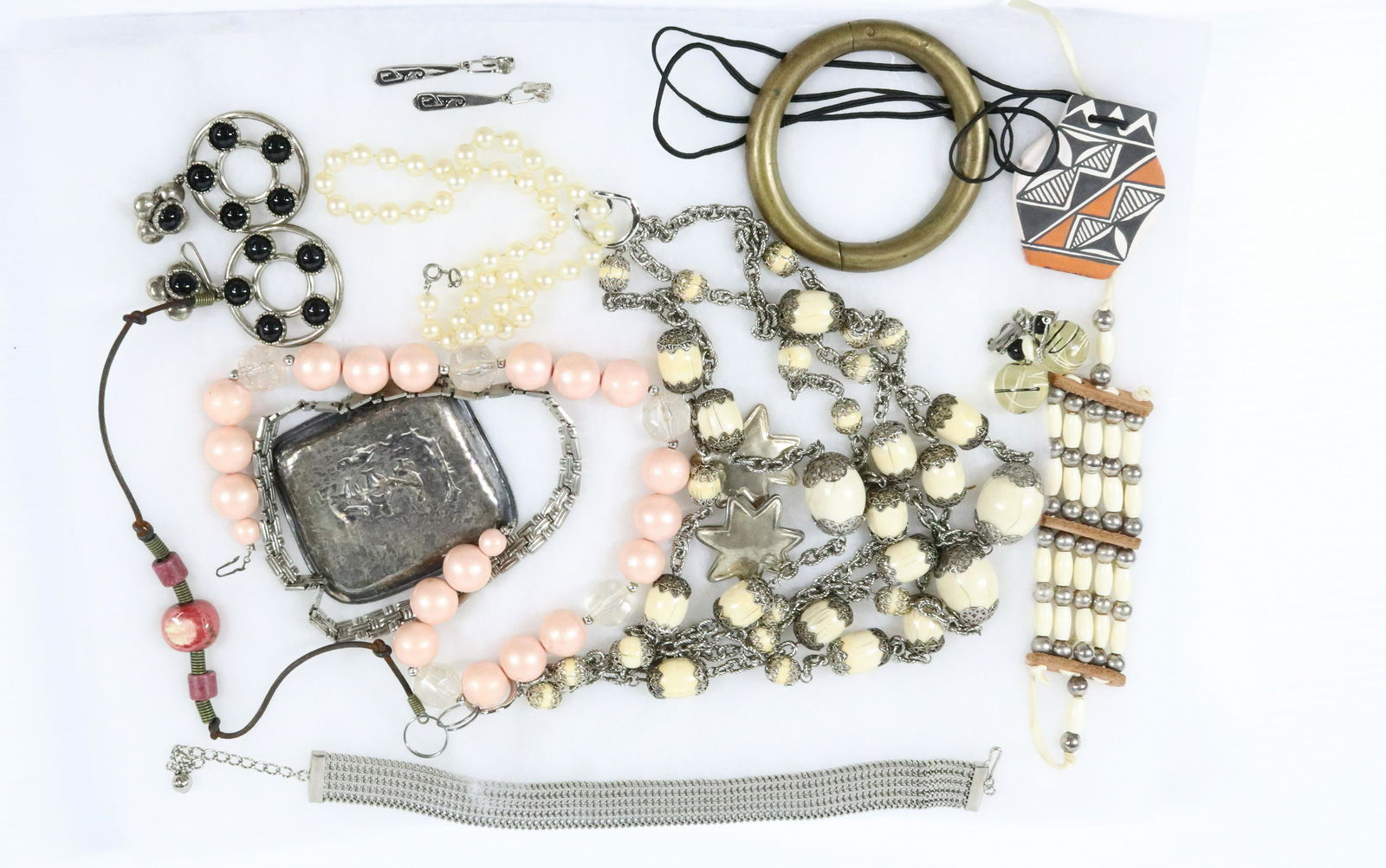 COSTUME JEWELRY TRAY LOT: LARGE NECKLACE ANTIQUE BULL RING NATIVE AMERICAN PENDANT AND EARRINGS LARGE BEAD NECKLACE 16" Terms: THIS IS AN ON-SITE ONLINE ONLY AUCTION. THE SALE ADDRESS IS 718 STOKES MILL RD. EAST STROUDSBURG, P