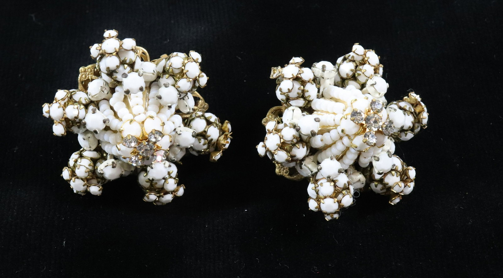 STANLEY HAGLER EARRINGS: WHITE RHINESTONE AND CRYSTAL WIRED CONSTRUCTION 1 1/2" DIAMETER UNMARKED Terms: THIS IS AN ON-SITE ONLINE ONLY AUCTION. THE SALE ADDRESS IS 718 STOKES MILL RD. EAST STROUDSBURG, PA 18302. THIS IS THE 