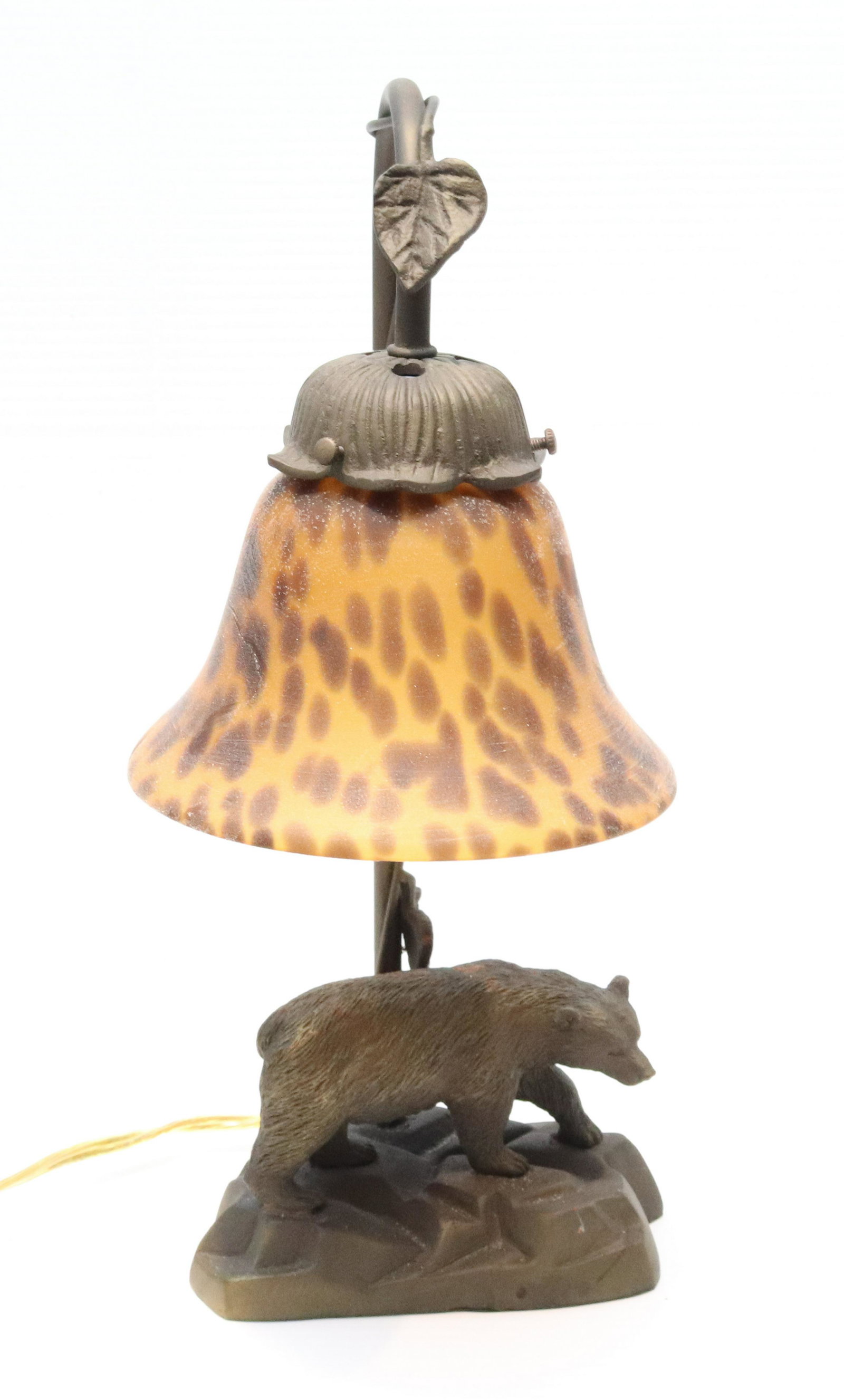 CONTEMPORARY METAL BEAR LAMP: CAST BEAR BASE WITH BROWN GLASS SHADE. WORKING ORDER. MEASURES 15" H. Terms: THIS IS AN ON-SITE ONLINE ONLY AUCTION. THE SALE ADDRESS IS 718 STOKES MILL RD. EAST STROUDSBURG, PA 18302. THIS IS THE EST
