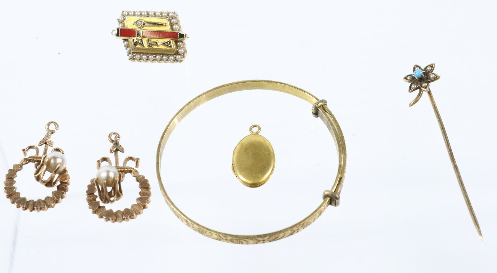 1OK JEWELRY GROUPING: INCLUDES ADJUSTABLE CHILDS BANGLE STICK PIN LOCKET PAIR VICTORIAN EARRING DROPS AND SORORITY PIN 7.7 DWT STICK PIN 1 3/4" BANGLE 1 1/2"D Terms: THIS IS AN ON-SITE ONLINE ONLY AUCTION. THE SALE ADDRESS