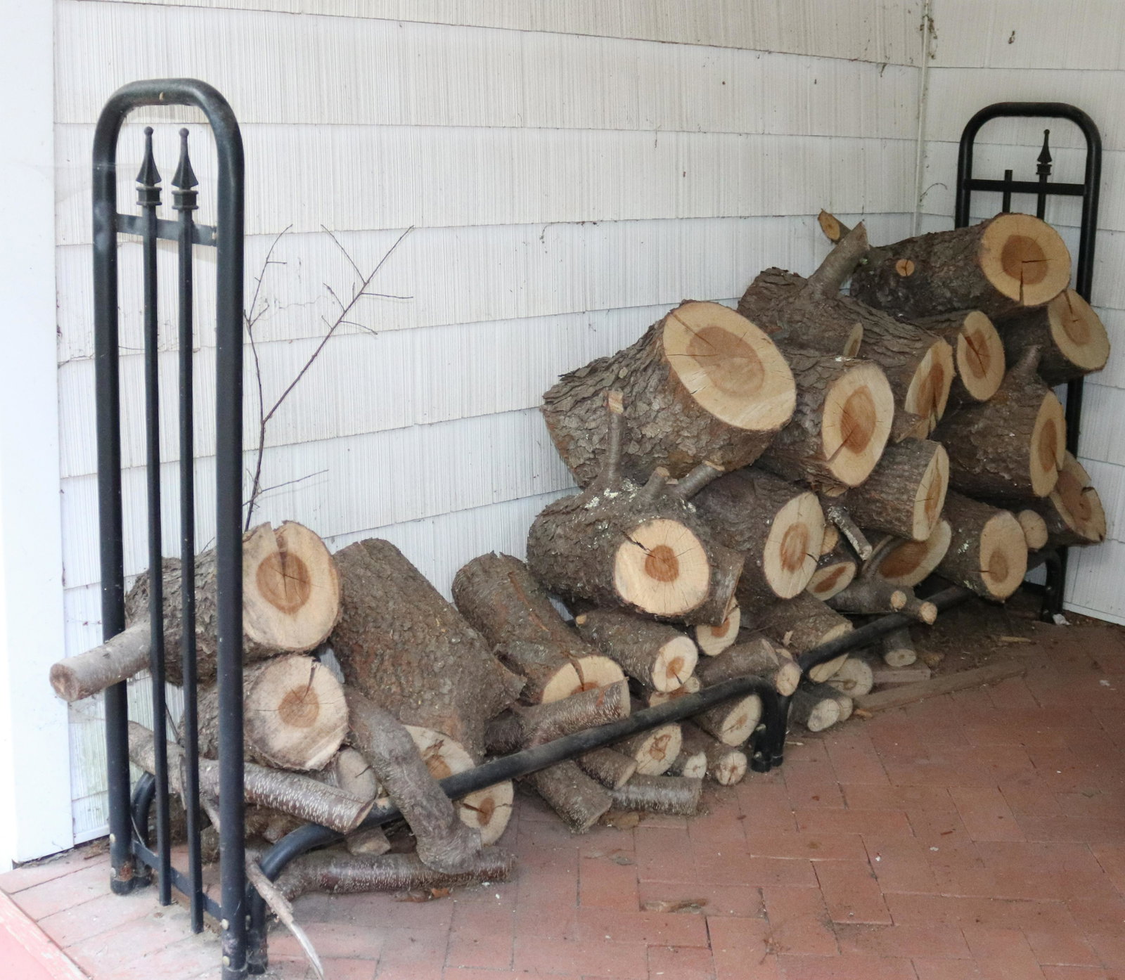METAL LOG HOLDER AND LOGS: PAINTED METAL. MEASURES 47" X 90" X 14" Terms: THIS IS AN ON-SITE ONLINE ONLY AUCTION. THE SALE ADDRESS IS 718 STOKES MILL RD. EAST STROUDSBURG, PA 18302. THIS IS THE ESTATE OF CANDACE BRIGGS. THERE W