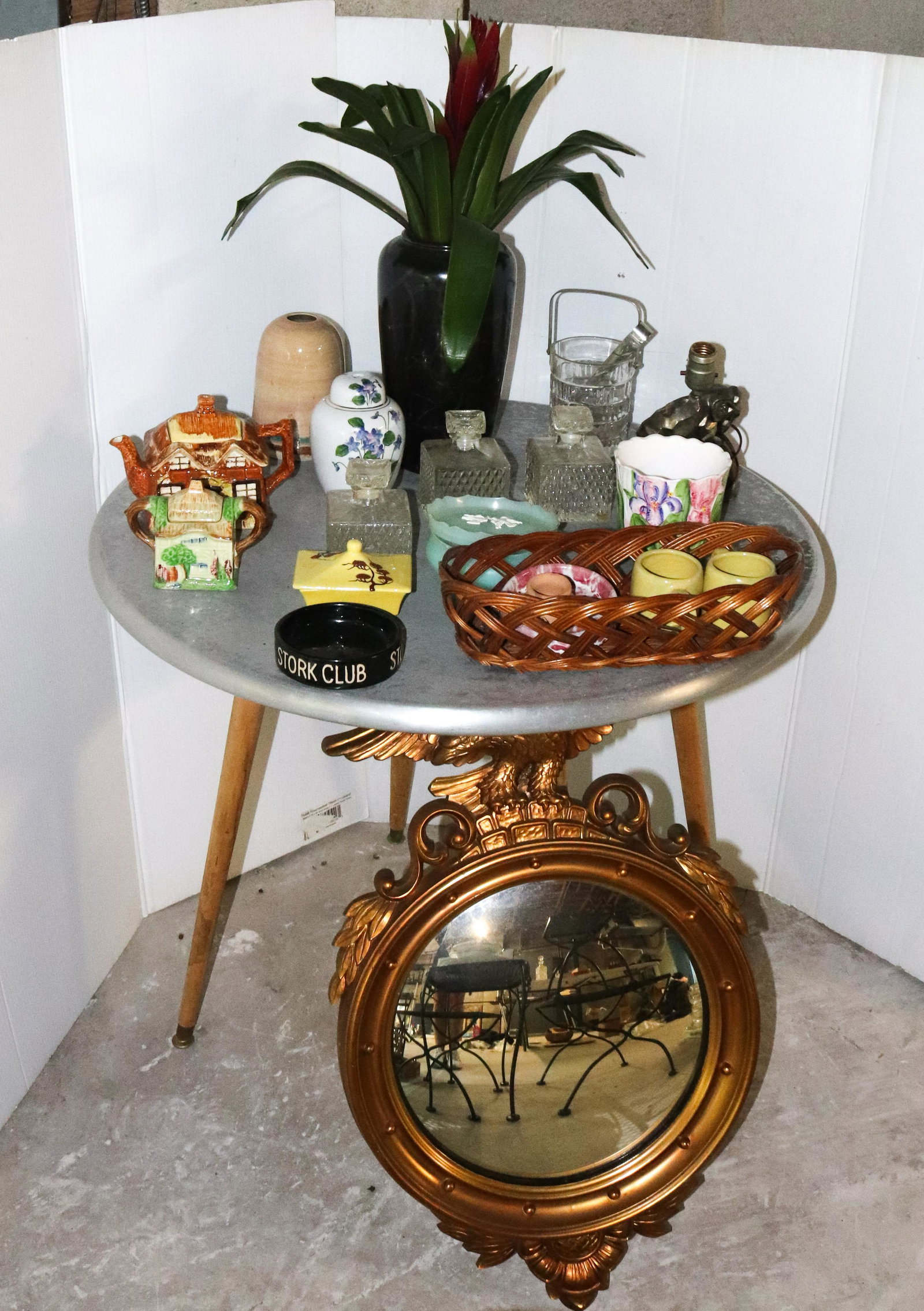 LITTLE OF EVERYTHING LOT: MIRROR, RD. TABLE, TEA POTS AND MORE TERMS: THIS IS AN ON-SITE ONLINE ONLY AUCTION. THE SALE ADDRESS IS 718 STOKES MILL RD. EAST STROUDSBURG, PA 18302. THIS IS THE ESTATE OF CANDACE BRIGGS. THERE WILL
