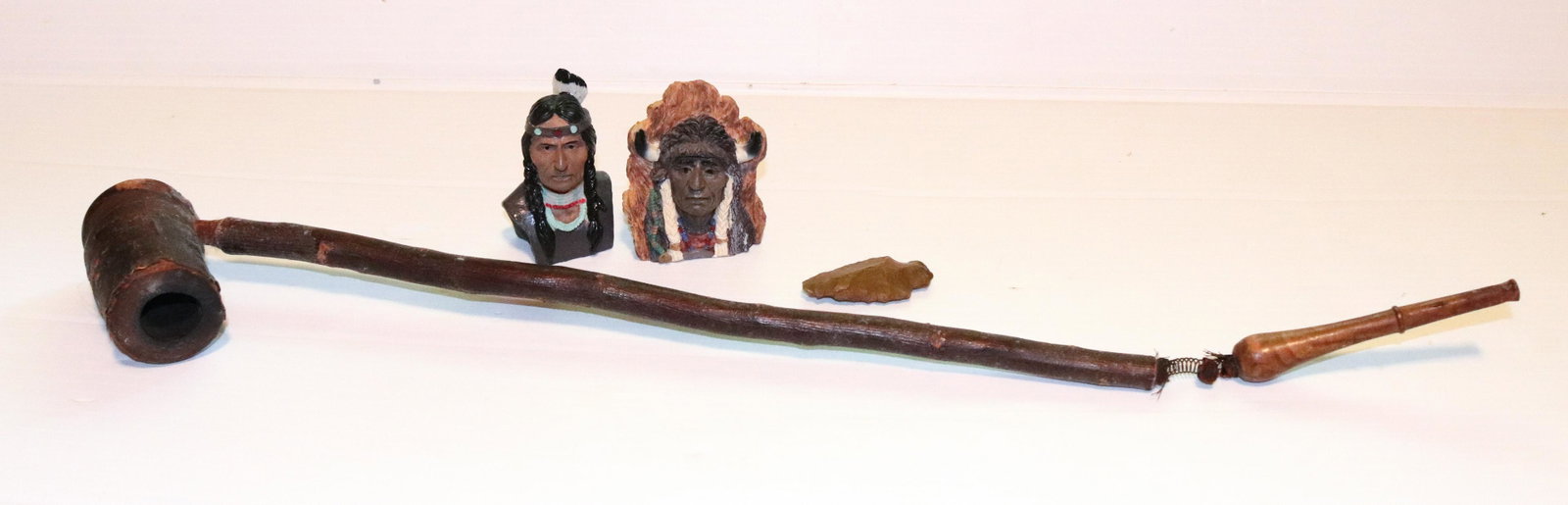 GROUP OF NATIVE AMERICAN ITEMS: PIPE, ARROW HEAD AND MORE TERMS: THIS IS AN ON-SITE ONLINE ONLY AUCTION. THE SALE ADDRESS IS 718 STOKES MILL RD. EAST STROUDSBURG, PA 18302. THIS IS THE ESTATE OF CANDACE BRIGGS. THERE WILL BE 2 PARTS