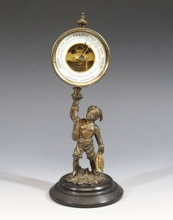 ANEROID FIGURAL BAROMETER: TABLE MODEL WITH BLACK MARBLE BASE BRONZE OF YOUNG FISHERMAN VERY DETAILED ENAMEL DIAL WORKING 9 1/2" X 4"