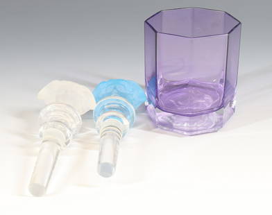 ROSENTHAL VERSACE GLASS GROUPING: (2) MEDUSA HEAD CHAMPAGNE BOTTLE STOPPERS AND AMETHYST TUMBLER MEDUSA IN BASE STOPPERS 5 1/4" LONG