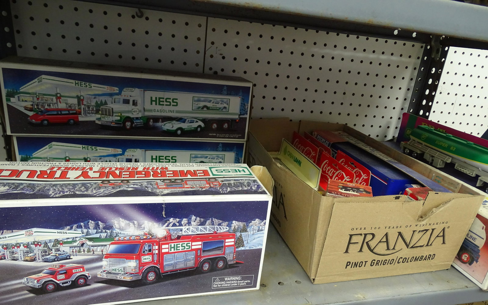 LOT OF TOYS: LARGE LOT OF HESS, BP AND OTHER TOYS PLEASE READ CAREFULLY BEFORE BIDDING. THIS SALE IS ONLINE ONLY AND PICK-UP ONLY. IF YOU CANNOT PICK THE ITEMS UP YOU PURCHASED PLEASE DO NOT BID. THERE ARE SOME IT