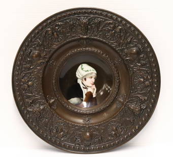 GERMAN BRASS WALL PLAQUE: WITH PORCELAIN PLATE INSERT PAINTING OF YOUNG LADY WITH BONNET PLAQUE HAS THREE MYTHICAL FACES WITH SHELLS DOLPHINS UNMARKED 19TH CENT. 17" DIA Terms: Please read Carefully before bidding. This