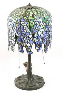 LEADED STAINED GLASS LAMP: IN TIFFANY STYLE CONTEMPORARY LAVENDER GREEN AND WHITE GLASS 19" X 10" Terms: Please read Carefully before bidding. This is a Two-Part Estate Sale. Pick-up for these sales will be Tuesday