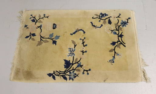 CHINESE WOOL RUG: HAND MADE TAN BACKGROUND WITH DARK BLUE FLORAL DESIGN 38" X 24 1/2" Terms: Please read Carefully before bidding. This is a Two-Part Estate Sale. Pick-up for these sales will be Tuesday November 8th th