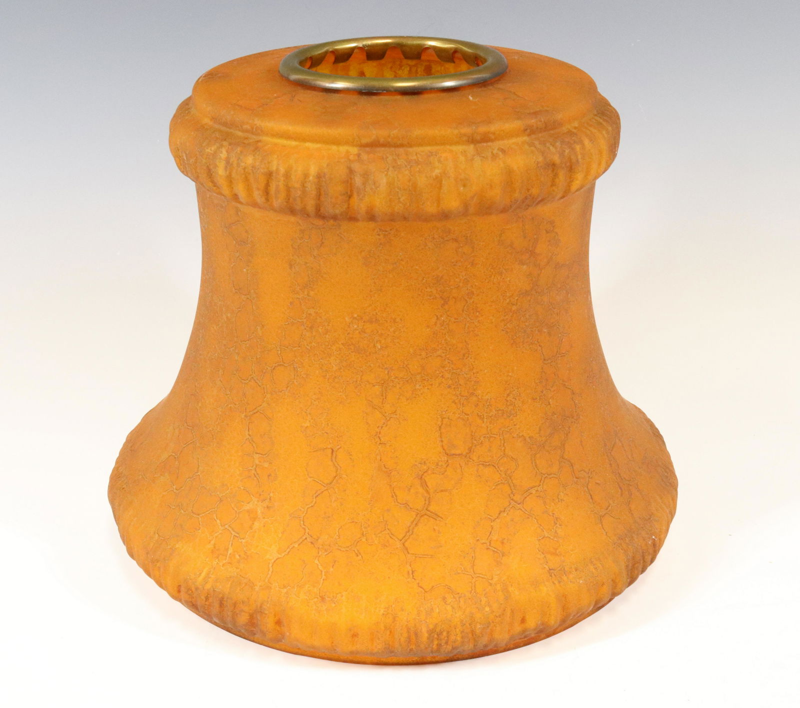 FRENCH GLASS SHADE: MOLDED WITH LINEN FOLD BORDERS ORANGE WITH GOLD VEINS MINERAL STAIN BRASS TOP RING 8 1/2"H X 10 1/4" Terms: Please read Carefully before bidding. This is a Two-Part Estate Sale. Pick-up for these sale