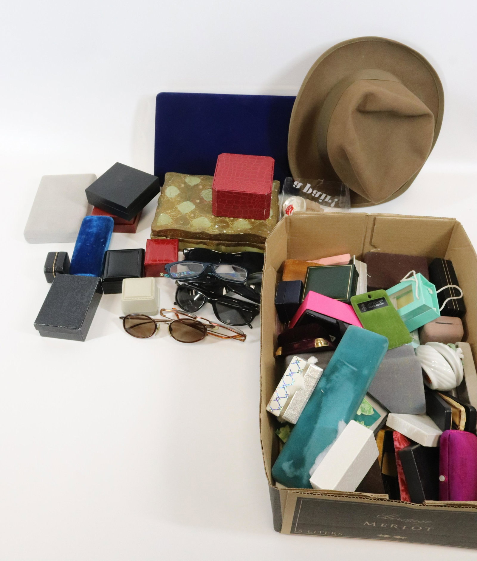 JEWELRY BOX GROUP: EMPTY JEWELRY BOXES OLD AND CONTEMPORARY , SUNGLASSES 12" X 16" Terms: Please read Carefully before bidding. This is a Two-Part Estate Sale. Pick-up for these sales will be Tuesday November 8th throug