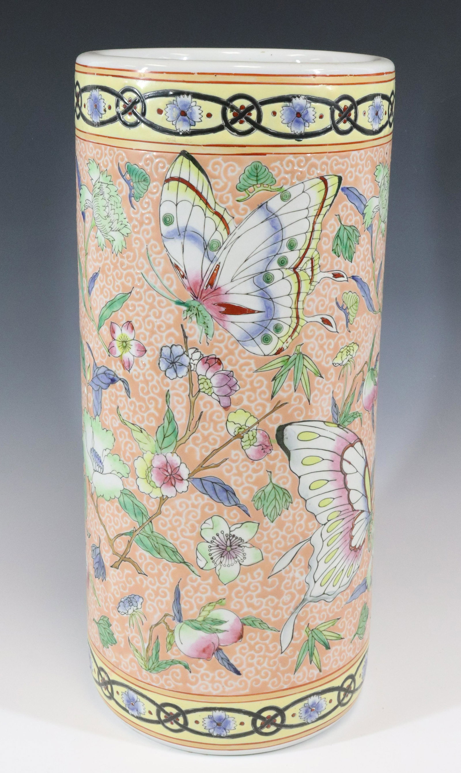 CHINESE PORCELAIN UMBRELLA STAND: HAND PAINTED BUTTERFLIES AND FLOWERS 18"H X 8 1/4" Terms: Please read Carefully before bidding. This is a Two-Part Estate Sale. Pick-up for these sales will be Tuesday November 8th through Friday Nove