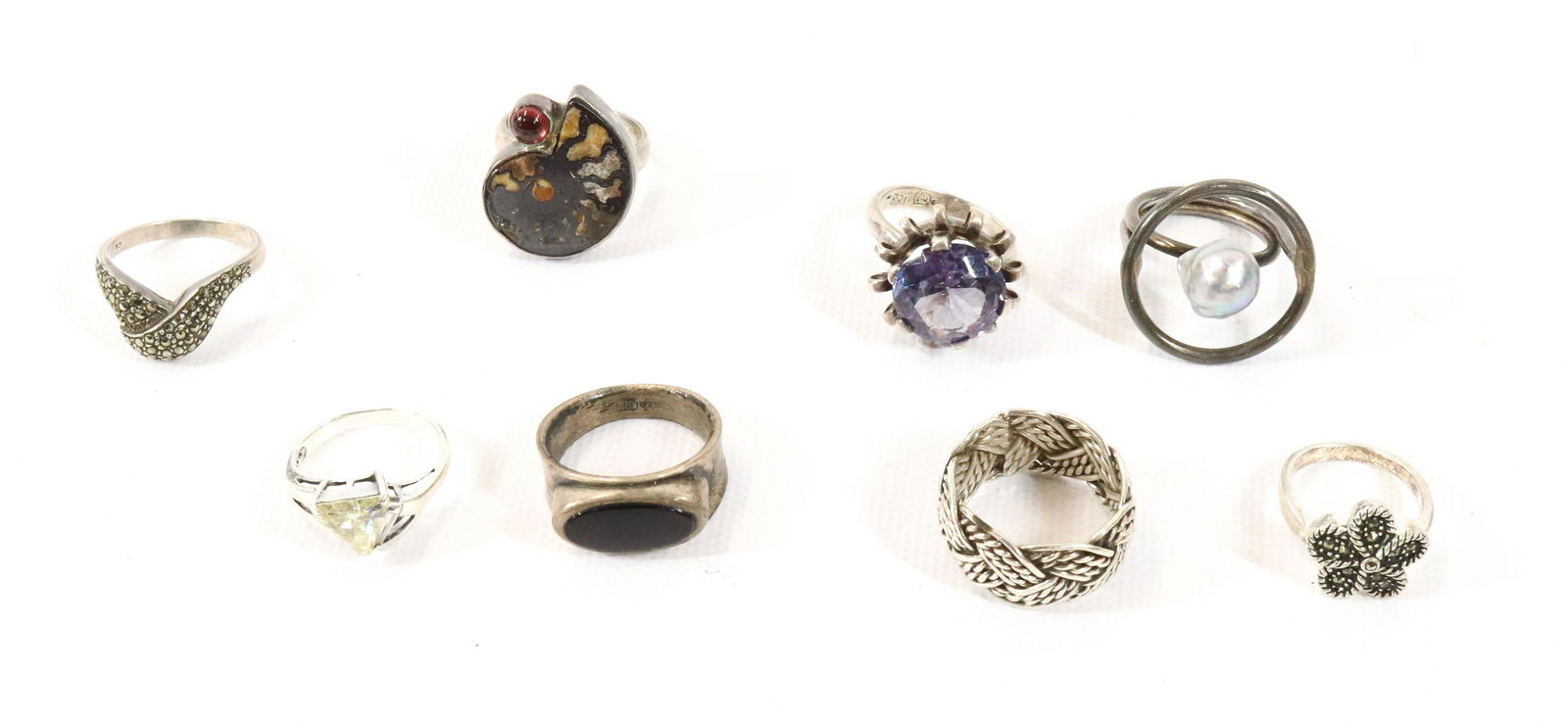 (7) STERLING SILVER RINGS: BAROQUE PEARL, FOSSIL, CZ, ONYX , SYNTHETIC ALEXANDRITE ETC. TOTAL WEIGHT 1.7 OZT Terms: Please read Carefully before bidding. This is a Two-Part Estate Sale. Pick-up for these sales will be Tuesday N