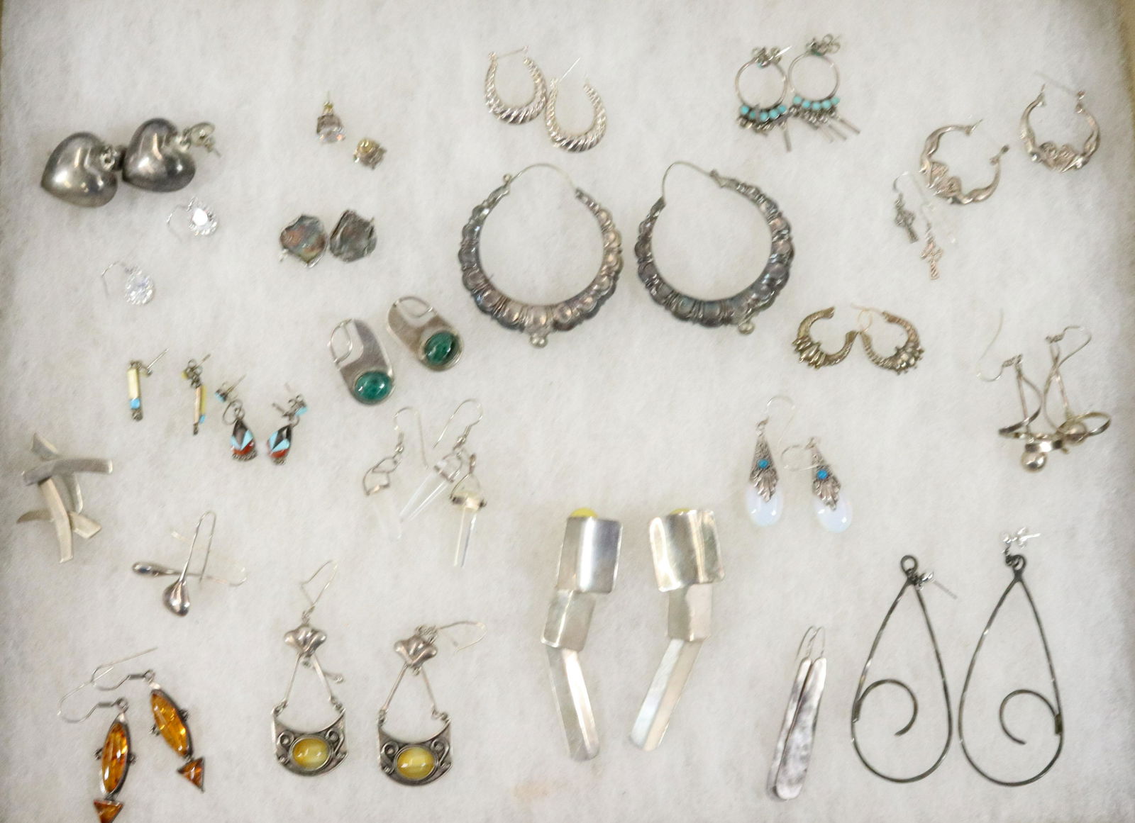 STERLING SILVER EARRINGS: (24 PAIR AND ONE PENDANT) NATIVE AMERICAN, AMBER, CZ, MALACHITE ETC. 1/2" TO 3" TOTAL WEIGHT 4.97 Terms: Please read Carefully before bidding. This is a Two-Part Estate Sale. Pick-up for these sales w