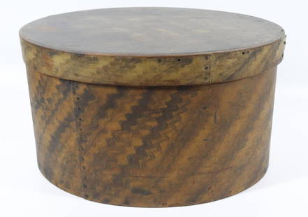 PAINT DECORATED OVAL WOODEN BOX: BROWN BACKGROUND WITH BLACK SQUIGGLY LINES - ORIGINALLY PURCHASED IN 1973 FROM LONG VALLEY, NJ - 9" X 15 1/2" X 12" Please Read Carefully before Bidding. Hartzell’s Auction Gallery Inc. will