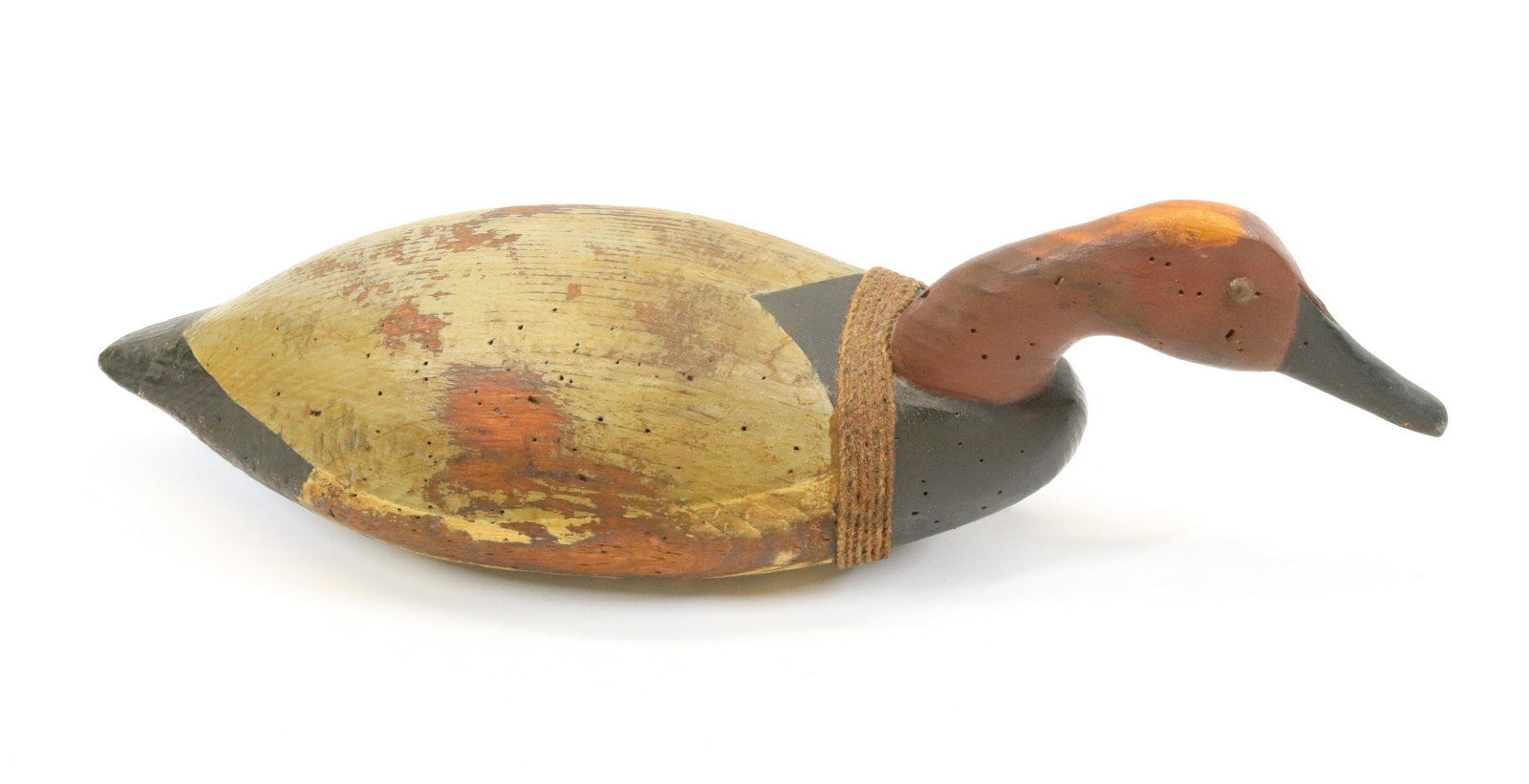 VINTAGE PAINTED DECOY: PAINTED ON WOOD. IMPRESSED "WHITE" ON BOTTOM. MEASURES 16 1/2" L.