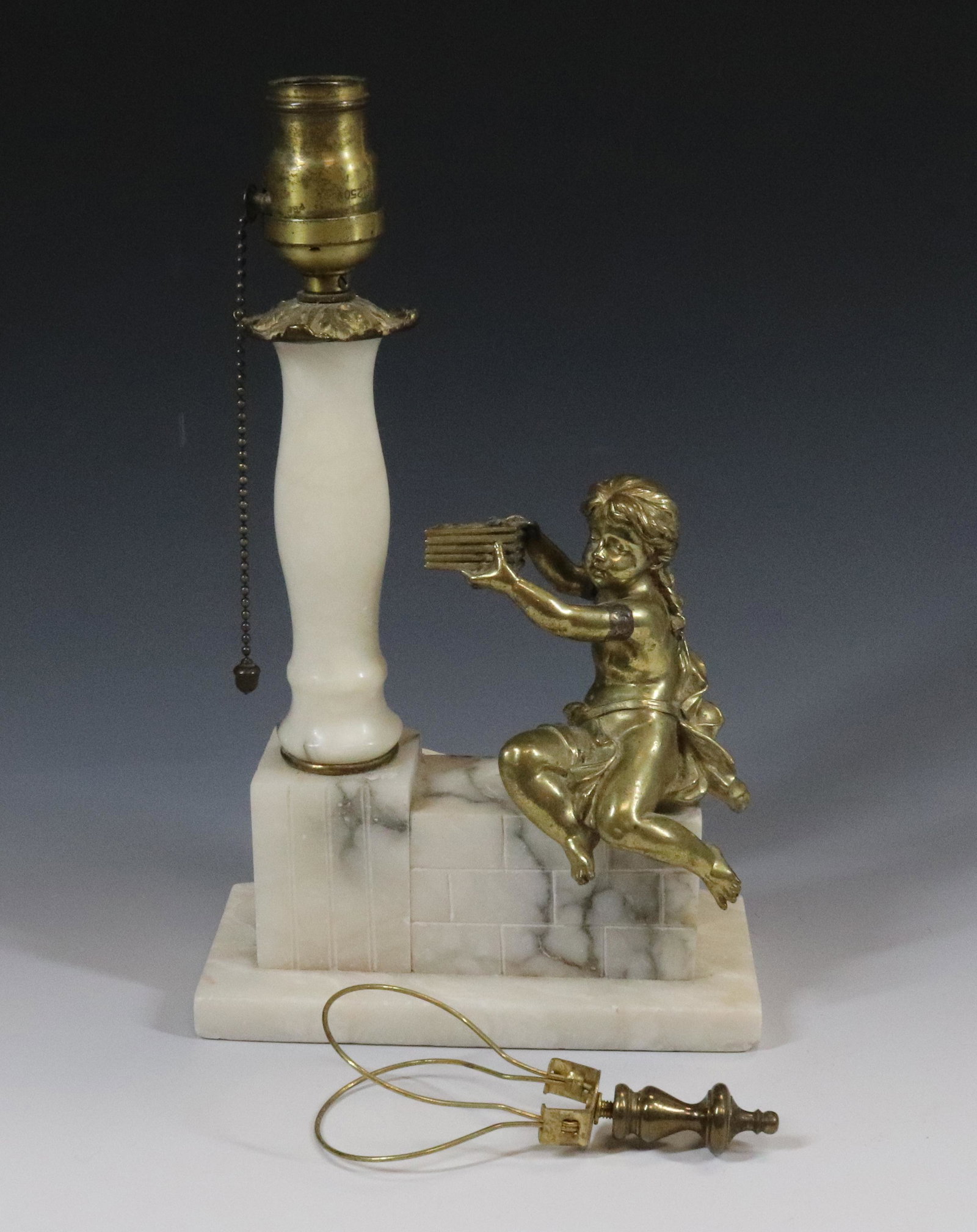 FRENCH ALABASTER LAMP: ALABASTER AND CAST BRASS FIGURE OF YOUNG GIRL HOLDING BASKET WITH BRASS CLIP ON SHADE MOUNT 1930S 12 1/2" X 7 1/2" UPDATED 2023 Terms for Purchasing and Shipping of Auction Items. Please read carefull