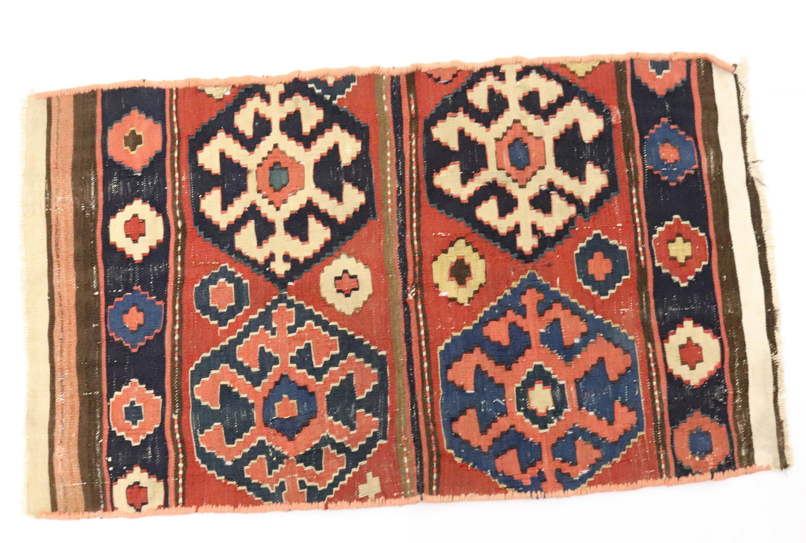 VINTAGE ORIENTAL THROW: RED/BLUE/CREAM//BROWN GEOMETRIC DESIGNS. MEASURES 36" X 21 1/2". UPDATED 2023 Terms for Purchasing and Shipping of Auction Items. Please read carefully before bidding. All payments for purchases will 