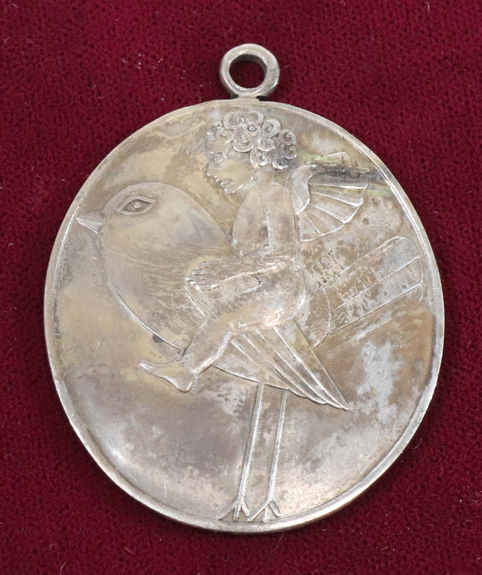 BERTOLD LOFFLER PENDANT: FRONT PART OF A PENDANT LOCKET. MRKD. ON BACK "WIENER WERK STATTE". SILVERPLATE. MEASURES 1 1/2" L. UPDATED 2023 Terms for Purchasing and Shipping of Auction Items. Please read carefully before biddin