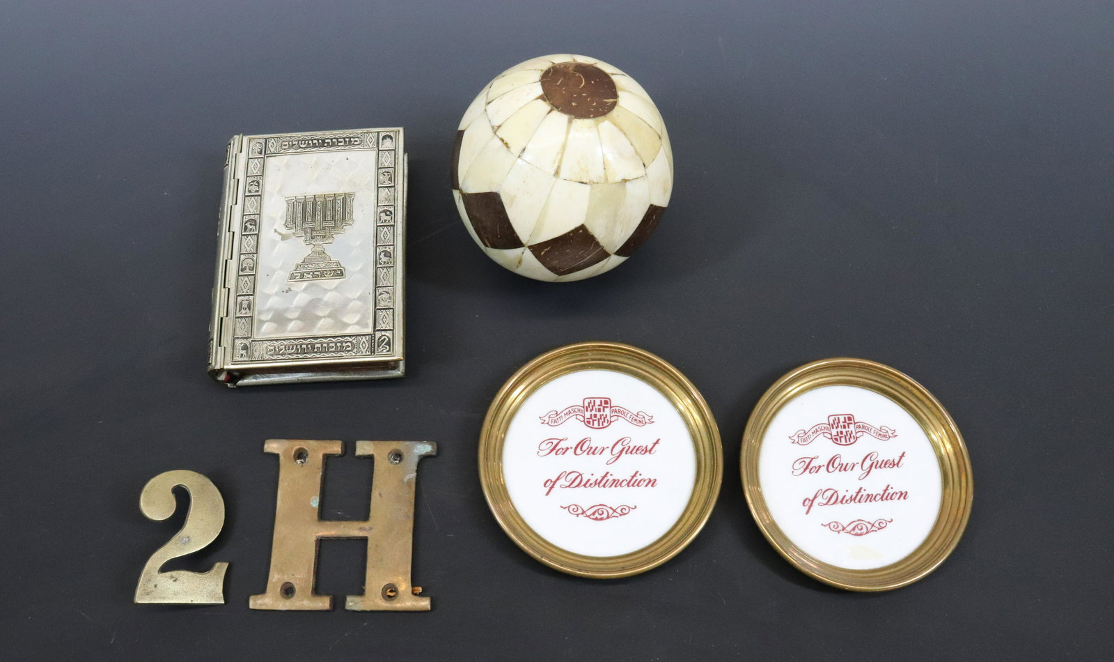 LOT OF VINTAGE SMALLS: INCLUDING: JEWISH SIDUR WITH METAL COVER (MISSING TWO STONES), 1950S COMMEMORATIVE COASTERS, BRASS LETTER/NUMBER AND MORE. UPDATED 2023 Terms for Purchasing and Shipping of Auction Items. Please read