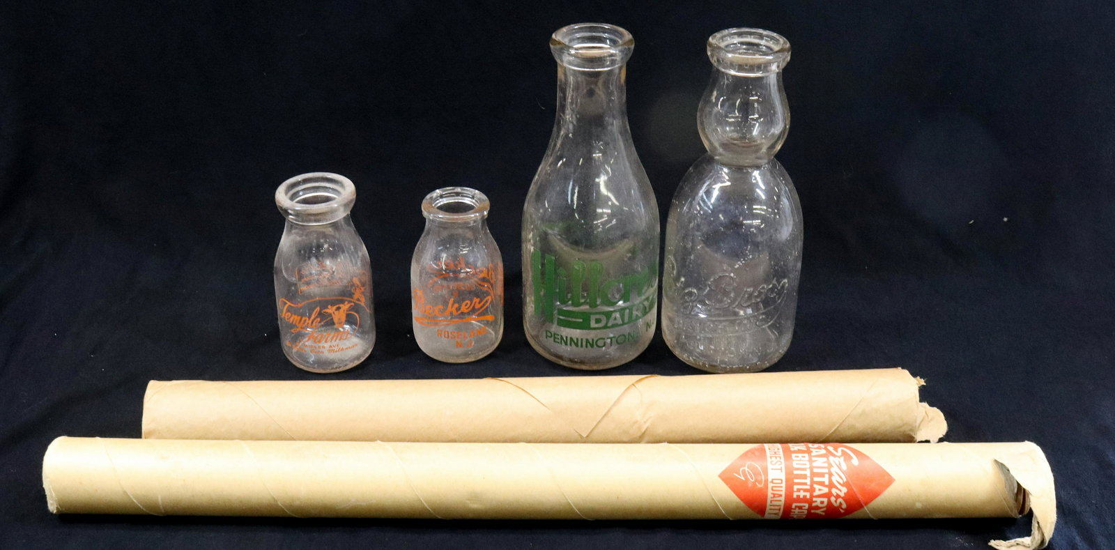 LOT OF MILK BOTTLES AND CAPS (1 of 4)