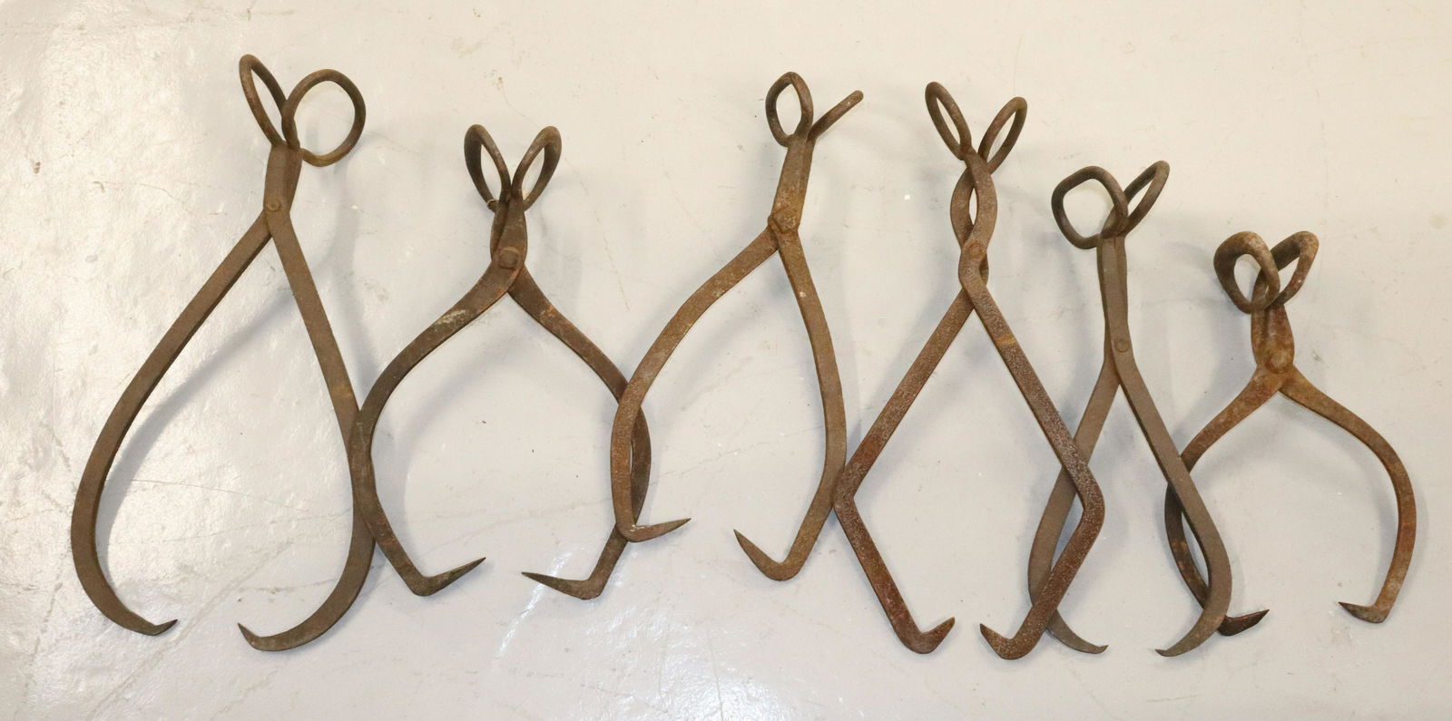 LOT OF ANTIQUE ICE TONGS (1 of 1)