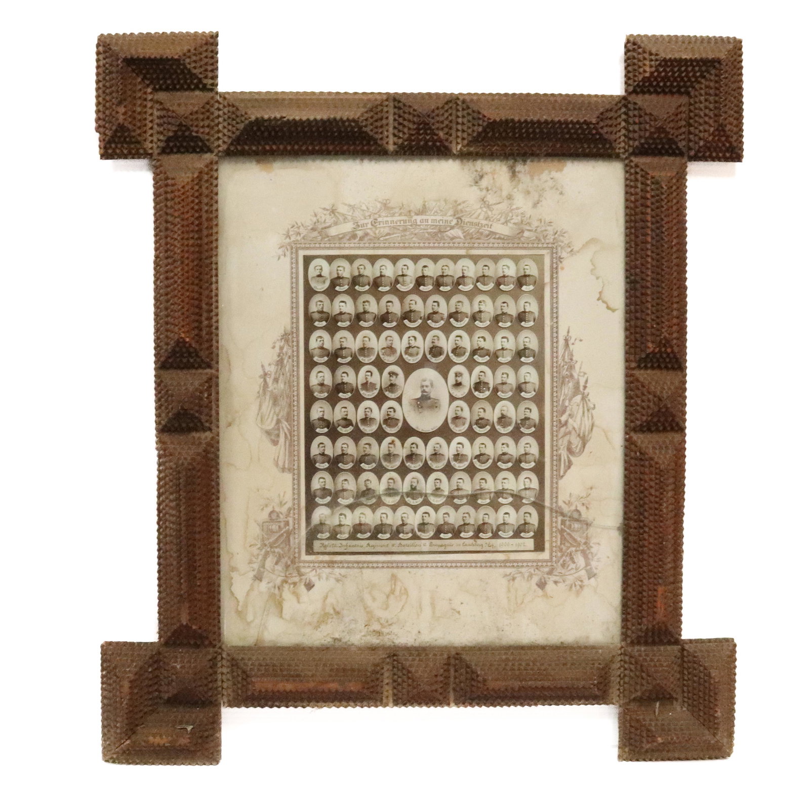 TRAMP ART FRAME: CHIP CARVED WITH GERMAN BATTALION PICTURE - INTERIOR 19" X 16" - EXTERIOR 29" X 25 1/4" PROVENANCE: UPDATED 2023 TERMS FOR PURCHASING AND SHIPPING OF AUCTION ITEMS. PLEASE READ CAREFULLY BEFORE BIDDIN