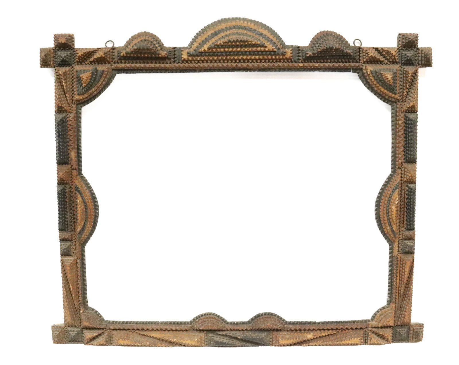 TRAMP ART FRAME: CHIP CARVED WITH BLACK ACCENTS - INTERIOR 17 1/4" X 21 1/4" - EXTERIOR 23 1/4" X 27" PROVENANCE: UPDATED 2023 TERMS FOR PURCHASING AND SHIPPING OF AUCTION ITEMS. PLEASE READ CAREFULLY BEFORE BIDDING. 