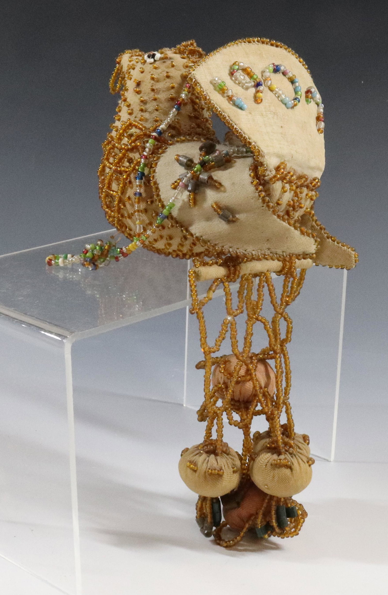 IROQUOIS BEADED BIRD WHIMSEY: DATED 1907 ON TAIL FEATHERS. MEASURES 11" X 6". UPDATED 2023 TERMS FOR PURCHASING AND SHIPPING OF AUCTION ITEMS. PLEASE READ CAREFULLY BEFORE BIDDING. ALL PAYMENTS FOR PURCHASES WILL BE MADE THROUGH L