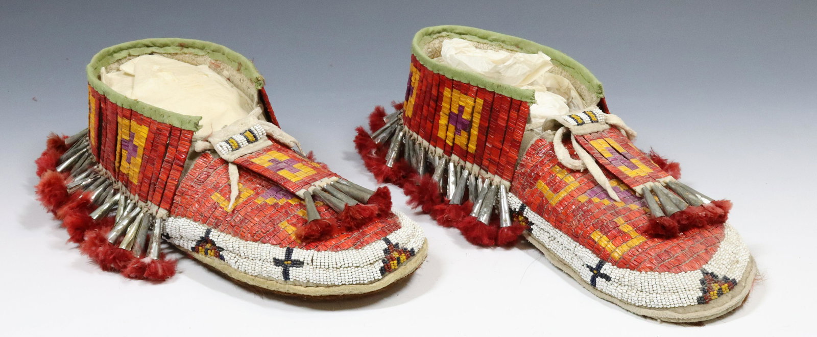 NATIVE AMERICAN QUILLED AND BEADED MOCCASINS: 11" L. UPDATED 2023 TERMS FOR PURCHASING AND SHIPPING OF AUCTION ITEMS. PLEASE READ CAREFULLY BEFORE BIDDING. ALL PAYMENTS FOR PURCHASES WILL BE MADE THROUGH LIVEAUCTIONEERS.COM PAYMENT PROCESSING CEN