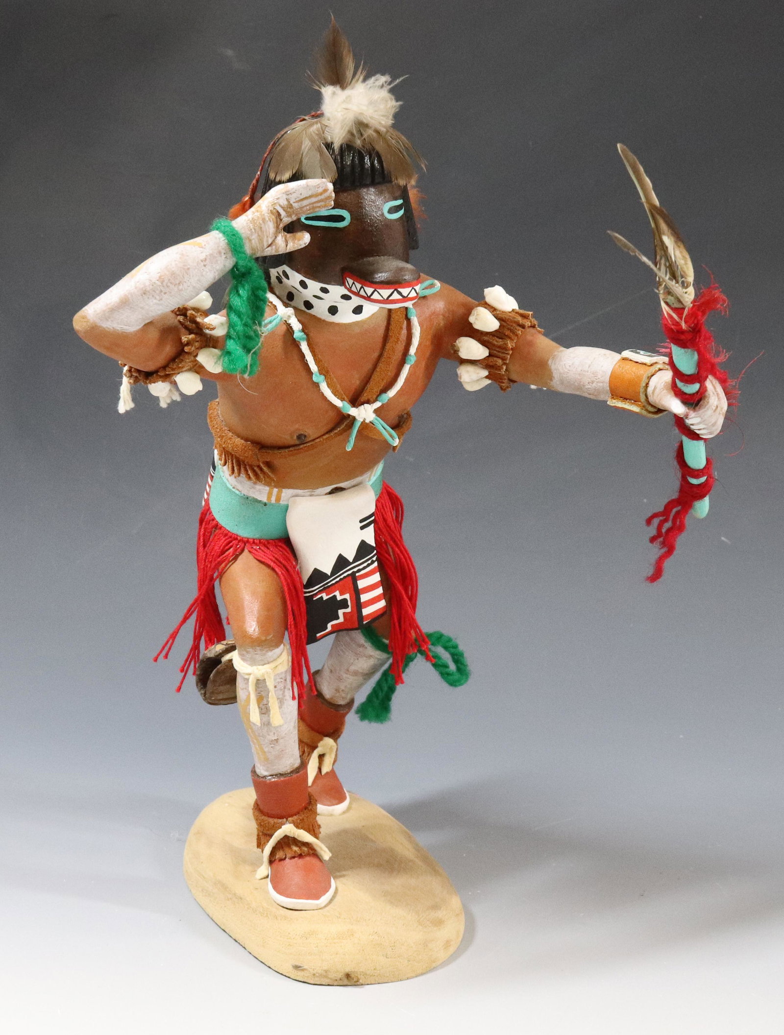 HOPI KACHINA SGND. GROVER: KACHINA DOLL MRKD. "TOTTO", MT. LION, GROVER ON BOTTOM. 10 1/2" H. UPDATED 2023 TERMS FOR PURCHASING AND SHIPPING OF AUCTION ITEMS. PLEASE READ CAREFULLY BEFORE BIDDING. ALL PAYMENTS FOR PURCHASES WIL