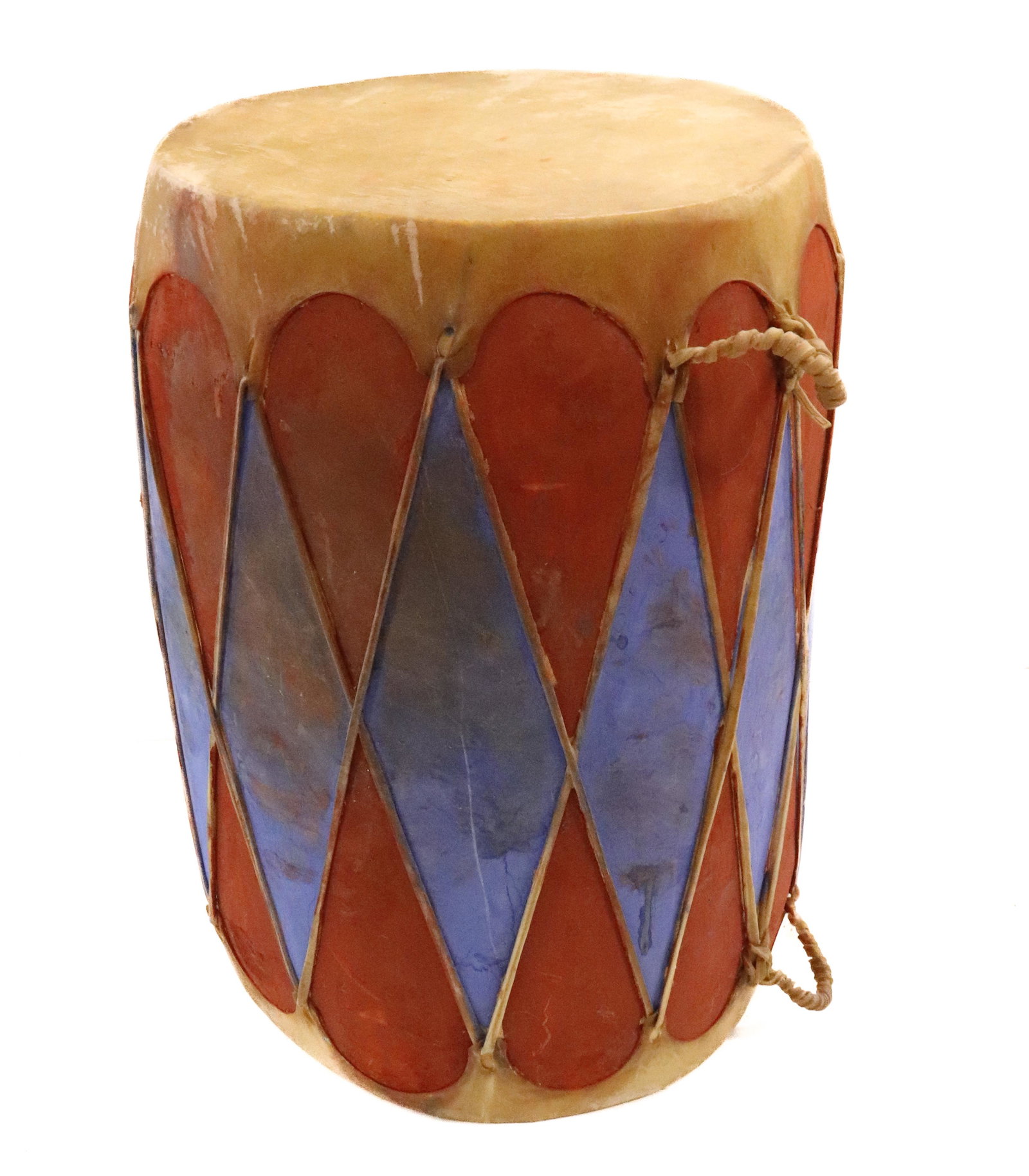NATIVE AMERICAN CEREMONIAL DRUM: BLUE/RED/TAN. 24" X 16". UPDATED 2023 TERMS FOR PURCHASING AND SHIPPING OF AUCTION ITEMS. PLEASE READ CAREFULLY BEFORE BIDDING. ALL PAYMENTS FOR PURCHASES WILL BE MADE THROUGH LIVEAUCTIONEERS.COM PAYM