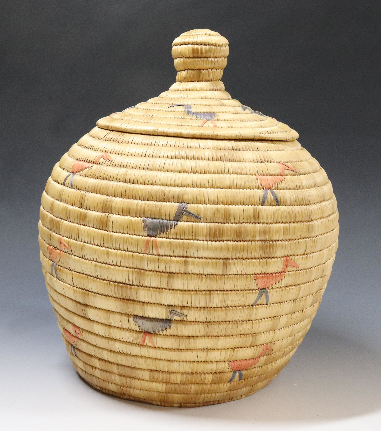 LG. VINTAGE ALASKAN ESKIMO LIDDED BASKET: COLORED BIRD MOTIF - 12 1/2" H X 10" UPDATED 2023 TERMS FOR PURCHASING AND SHIPPING OF AUCTION ITEMS. PLEASE READ CAREFULLY BEFORE BIDDING. ALL PAYMENTS FOR PURCHASES WILL BE MADE THROUGH LIVEAUCTIONE