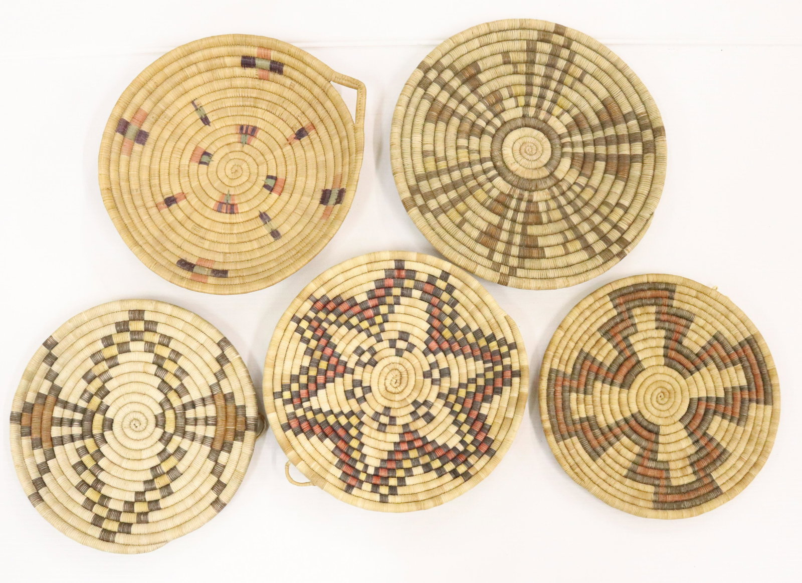 LOT OF COILED BASKETS: (5) ROUND COILED BASKETS WITH DYED WEAVERS - 11" TO 12 3/4" D UPDATED 2023 TERMS FOR PURCHASING AND SHIPPING OF AUCTION ITEMS. PLEASE READ CAREFULLY BEFORE BIDDING. ALL PAYMENTS FOR PURCHASES WILL BE 